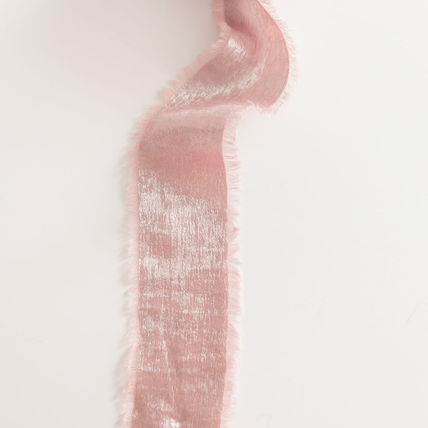 Close-up of ribbon texture showing color-shifting shimmer