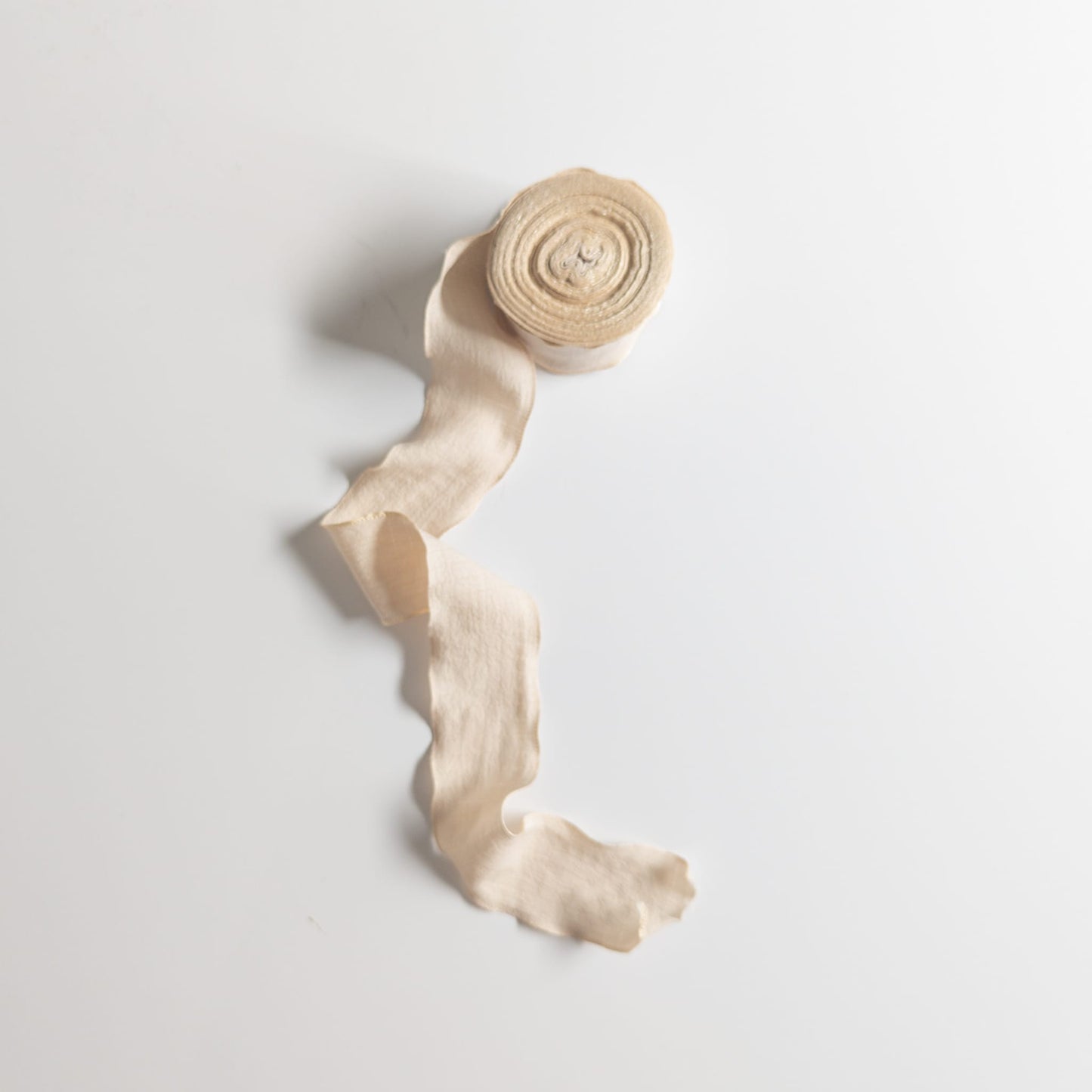 Close-up of 1.5-inch ruffle ribbon showcasing delicate fabric texture