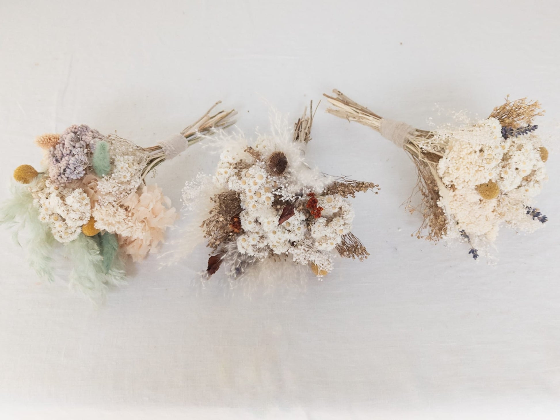 Bohemian-inspired wedding favor featuring a dried flower bouquet