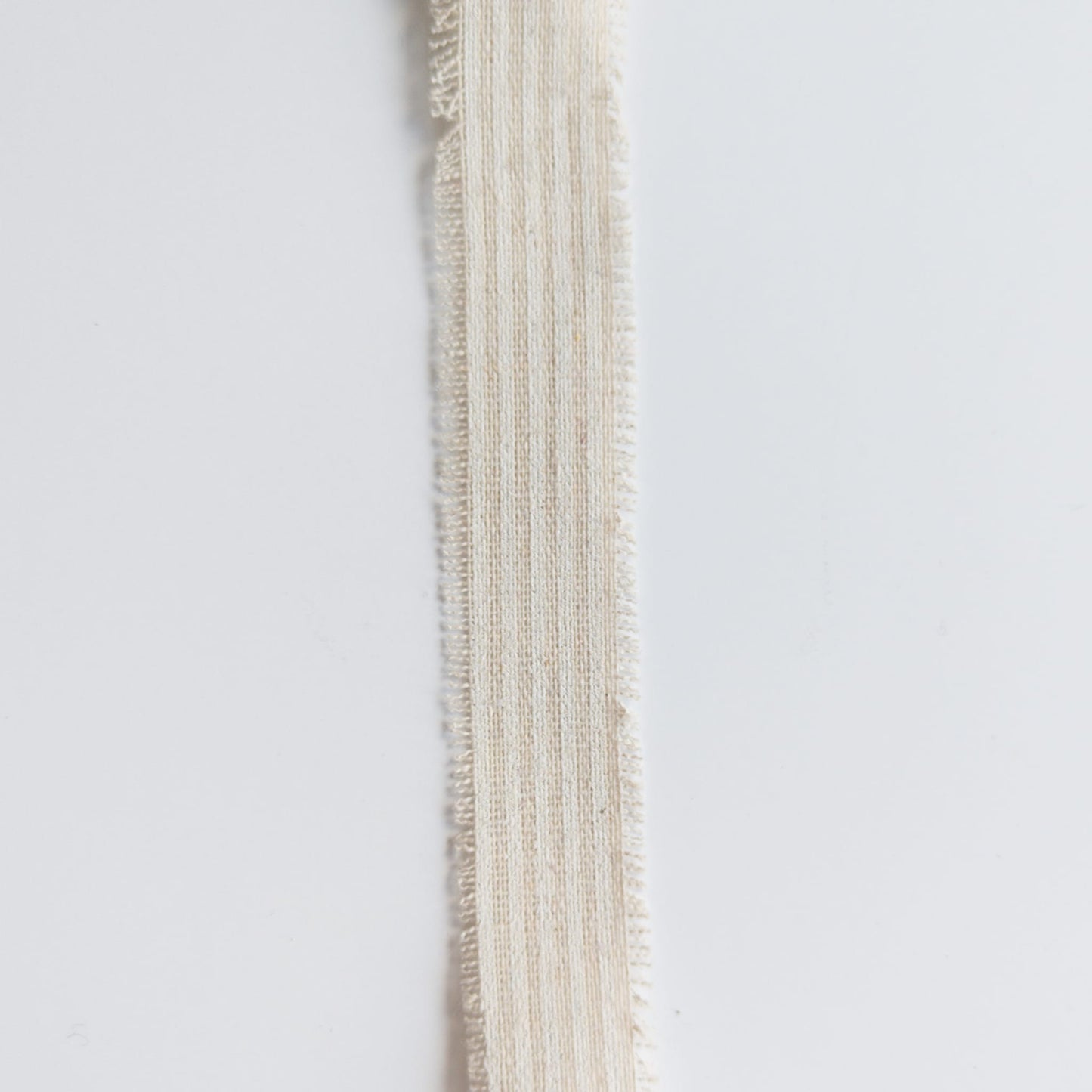 Hand-tied bow made from linen ribbon for an organic, natural touch
