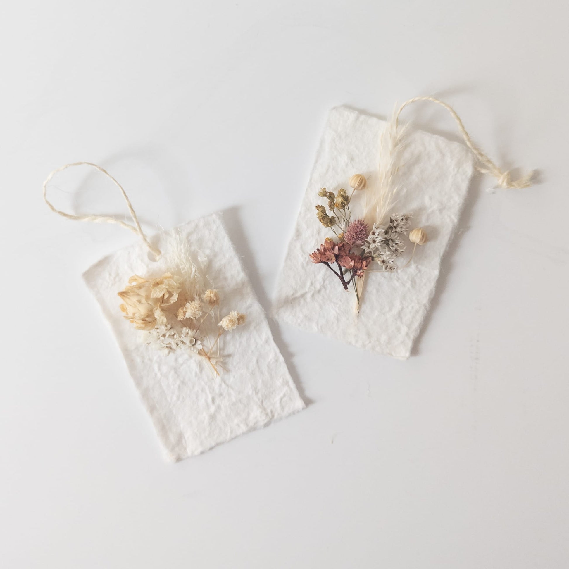Rustic wedding favor with a handmade dried flower gift tag