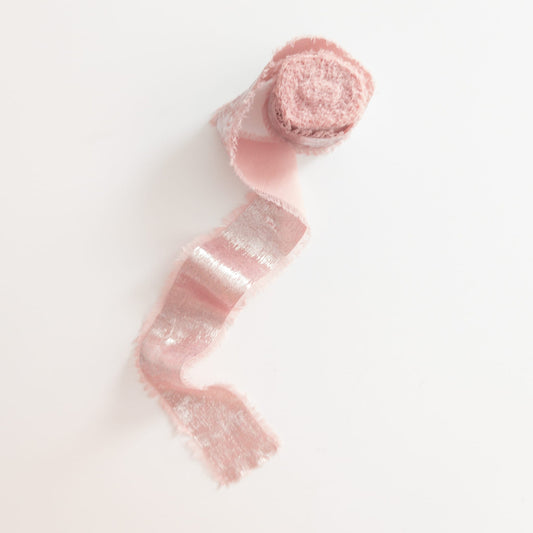 Shimmery ribbon used for DIY party decorations and favors

